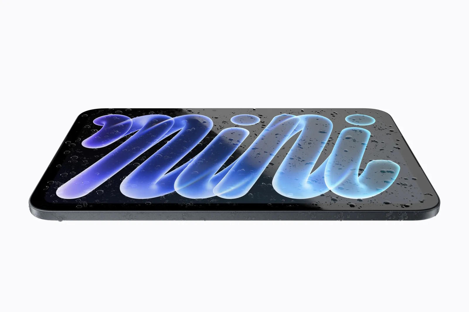 iPad mini is shown lying flat with droplets of water on it. — Picture from apple.com