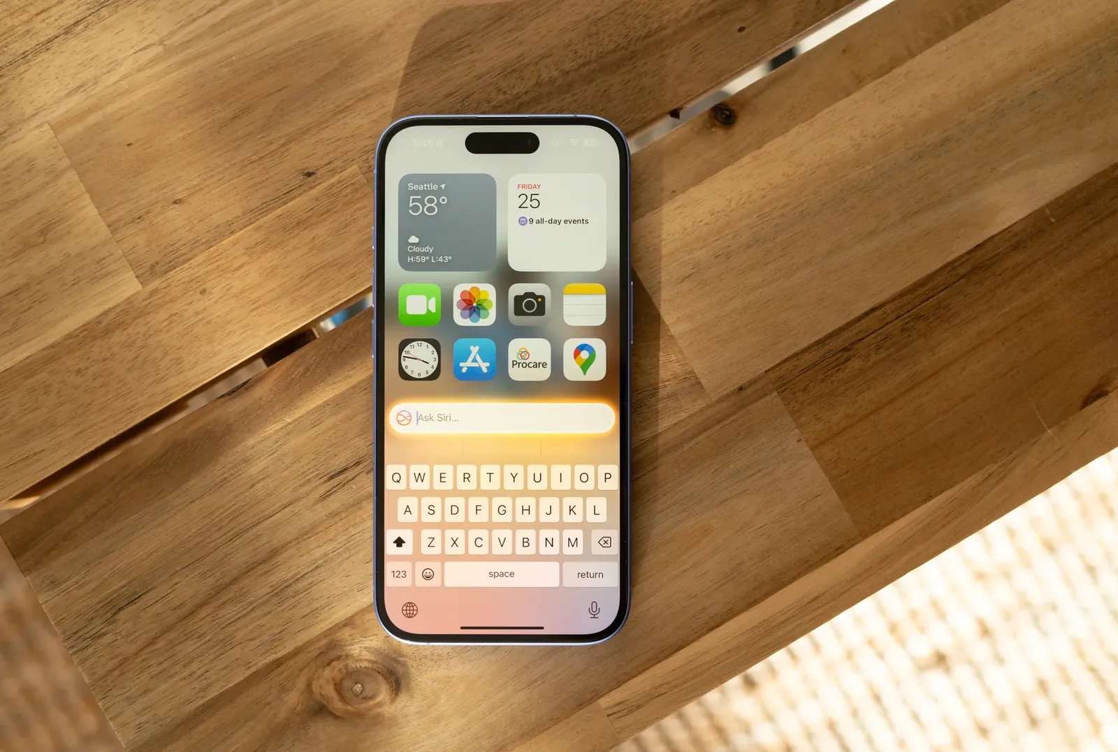 Image of iPhone 16 running iOS 18.1 with Apple Intelligence on a bench. — Picture from theverge.com